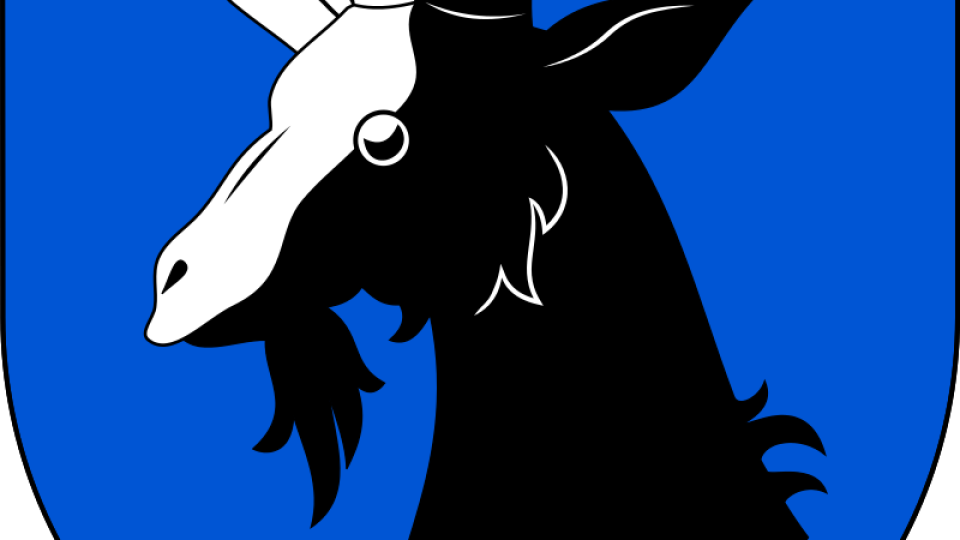 Znak Kopidlna - hlava kozla na modrém poli
